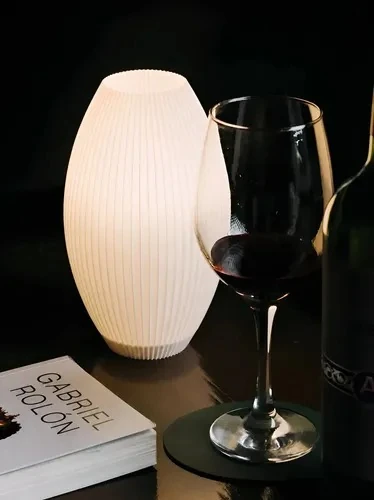 Small white ribbed barrel-shaped table lamp, 20 cm tall