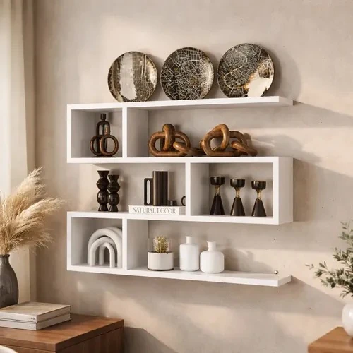 Wide white floating wall shelf unit with open rectangular cubbies