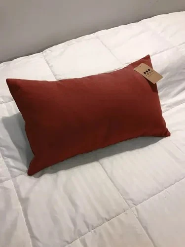 Rust-red plain rectangular cushion, 50 x 30 cm