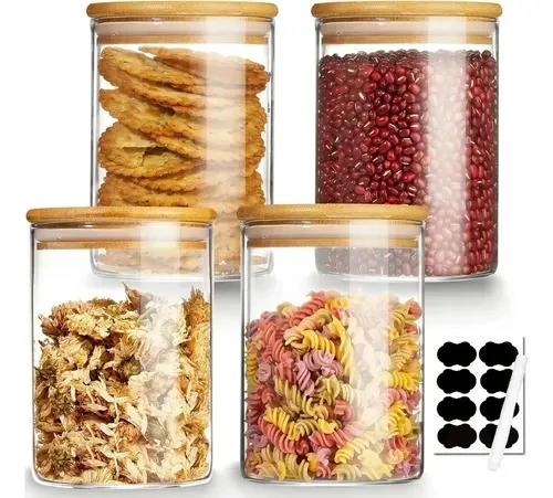 Set of four wide clear glass jars with bamboo lids